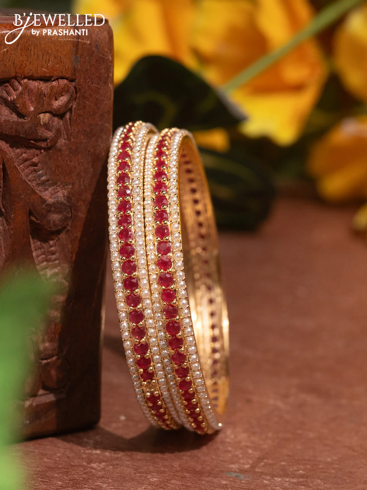 Pearl Bangles with ruby stones pearls in gold finish