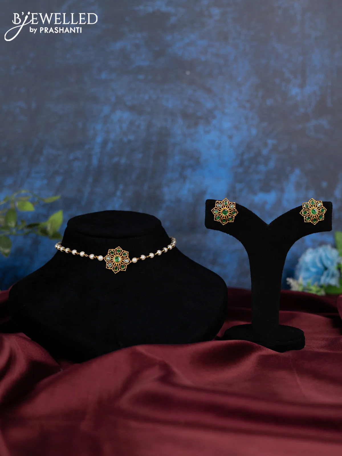 Pearl choker with emerald and cz stones