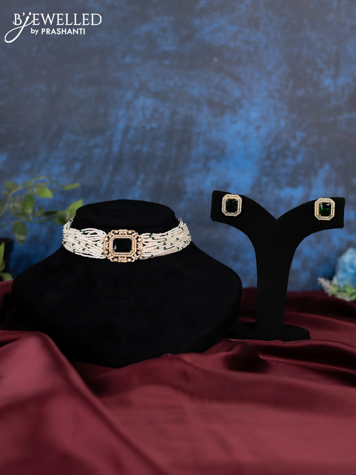 Pearl choker with emerald and cz stones