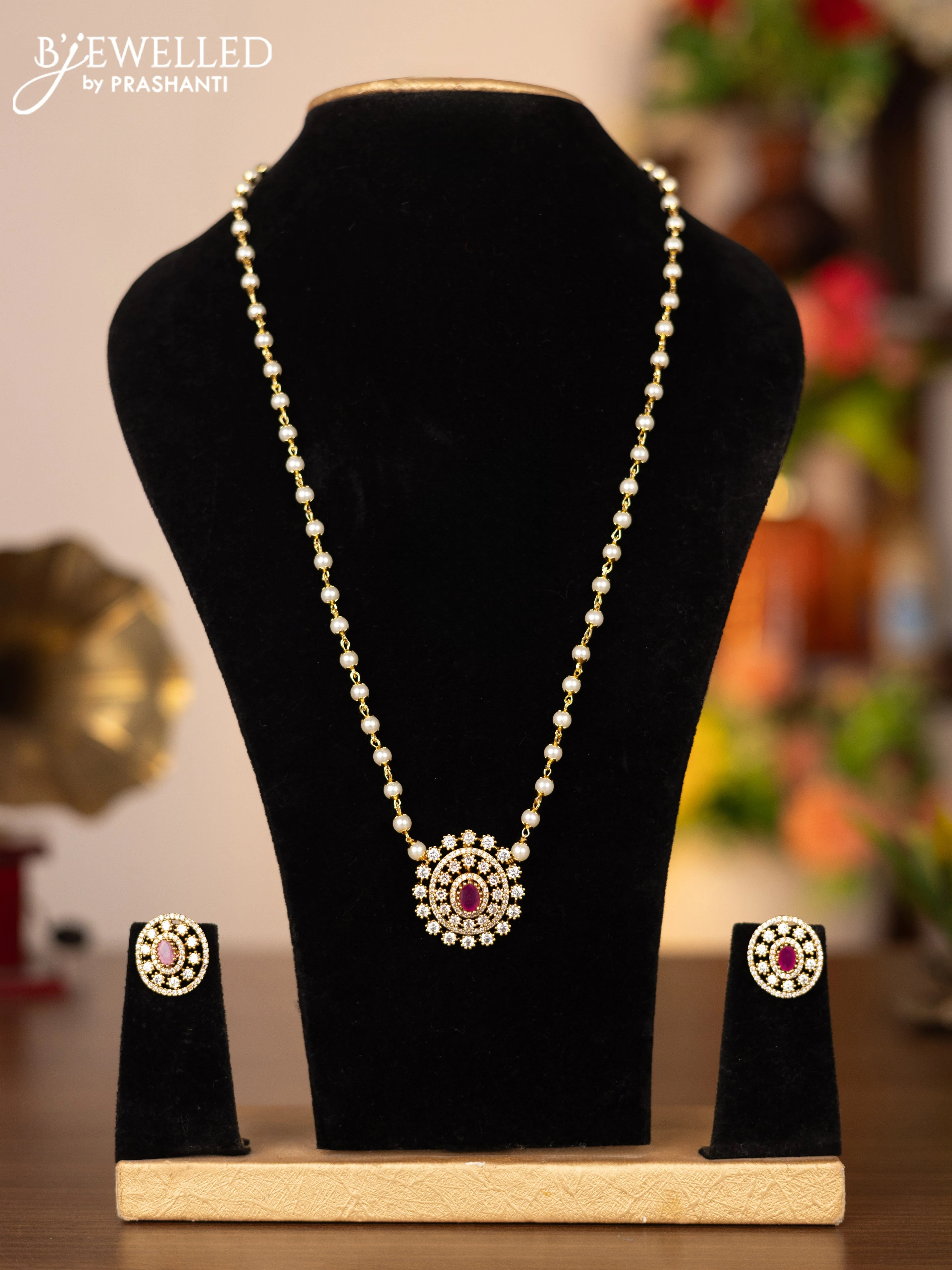 Pearl necklace with ruby and cz stones