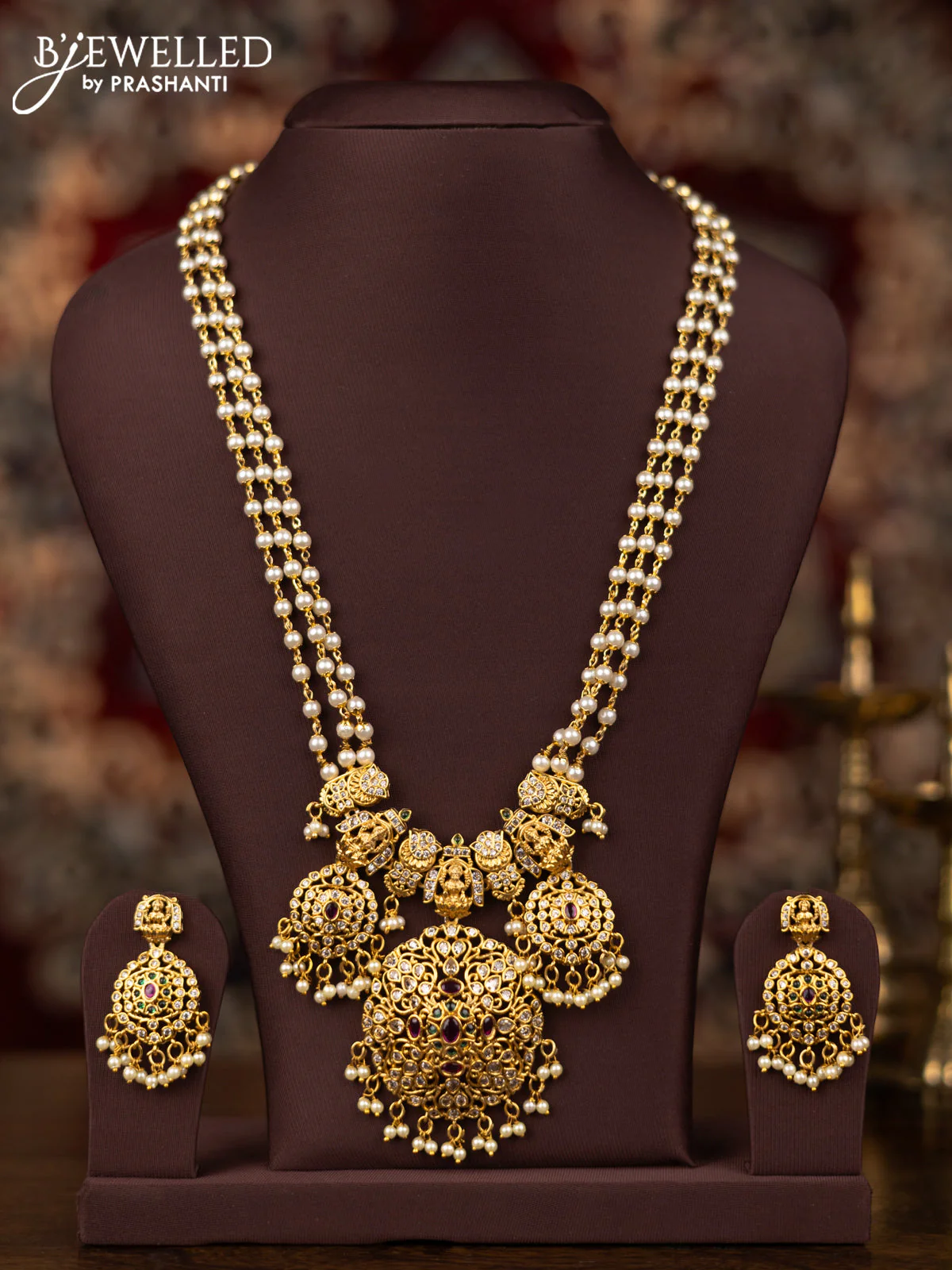 Pearl triple layer haram lakshmi design with kemp & cz stones and pearl hanging