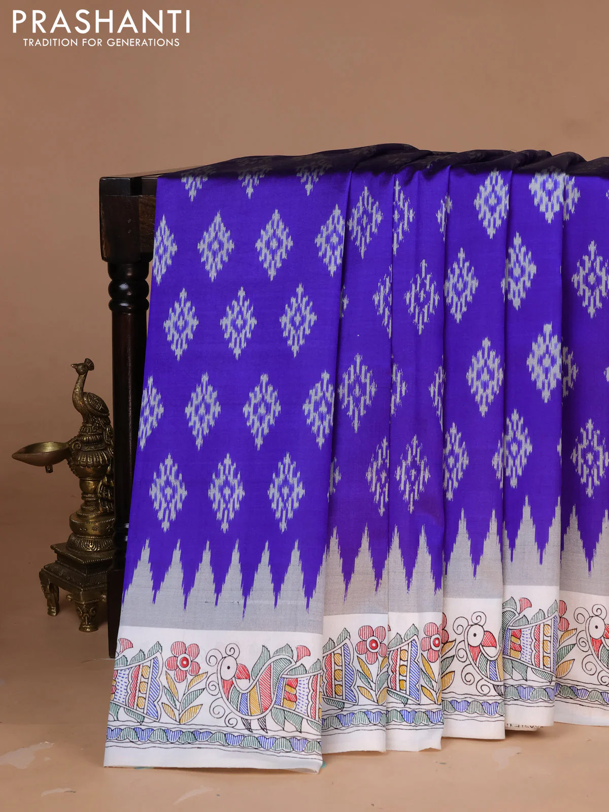 Pochampally silk saree blue and off white with allover ikat woven buttas and madhubani prints