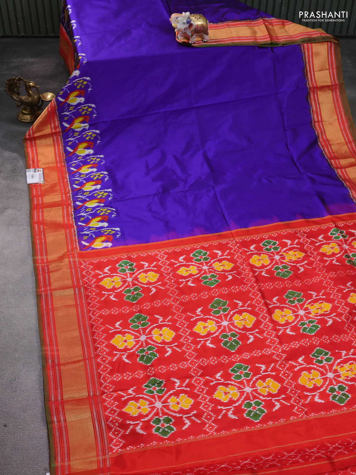Pochampally silk saree blue and orange with plain body andlong ikat woven zari border - Image 2