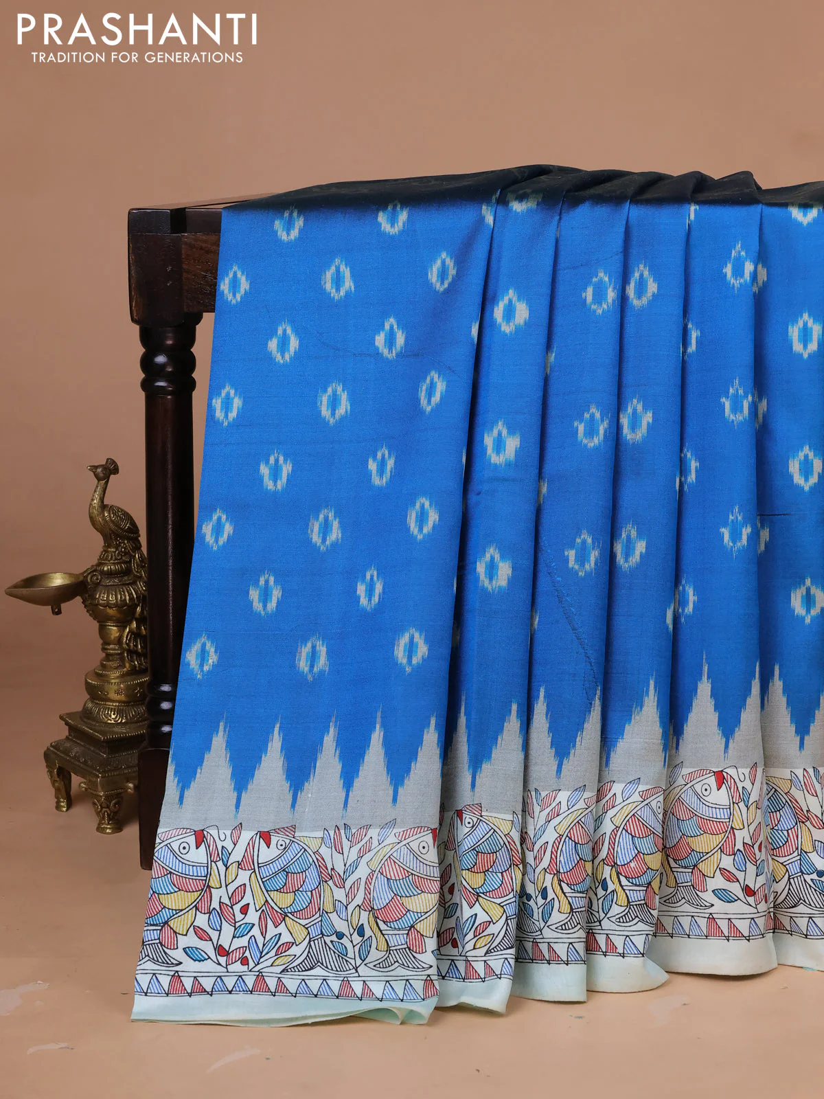 Pochampally silk saree cs blue and cream with allover ikat woven buttas and madhubani prints