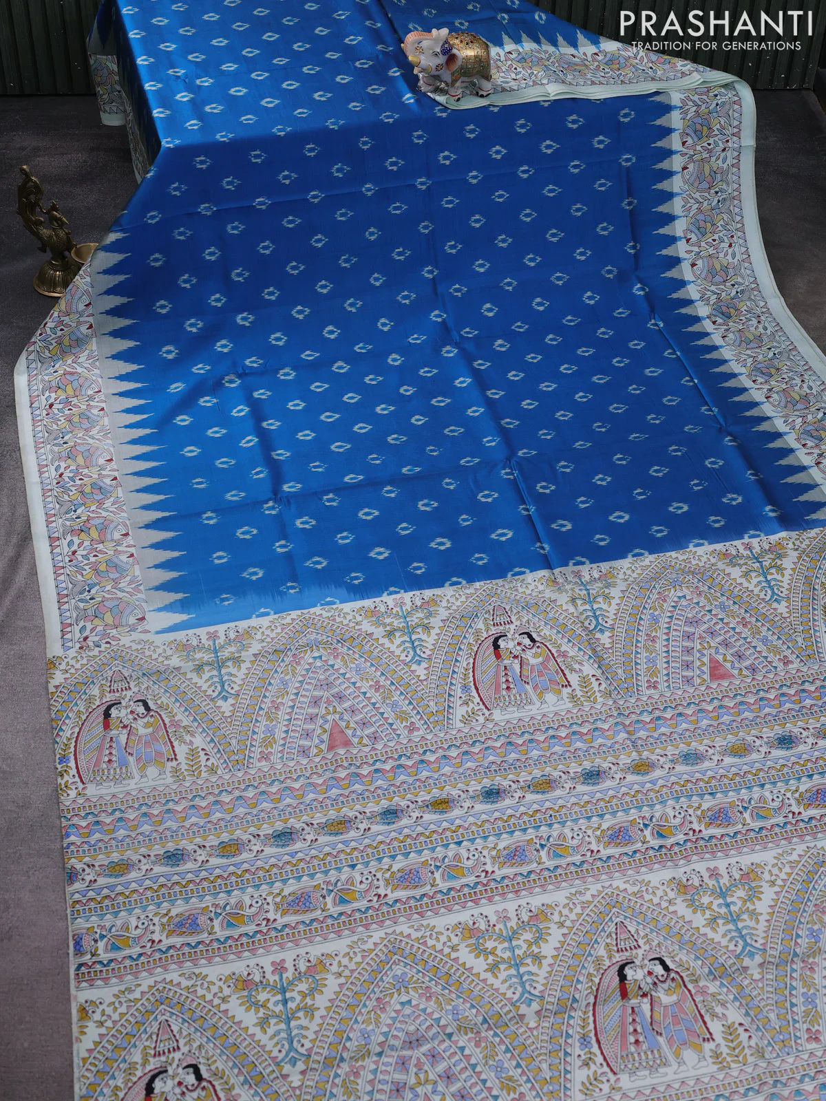 Pochampally silk saree cs blue and cream with allover ikat woven buttas and madhubani prints - Image 2