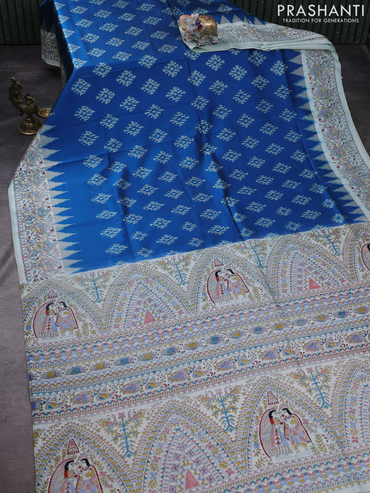 Pochampally silk saree cs blue and cream with allover ikat woven buttas and madhubani prints - Image 2