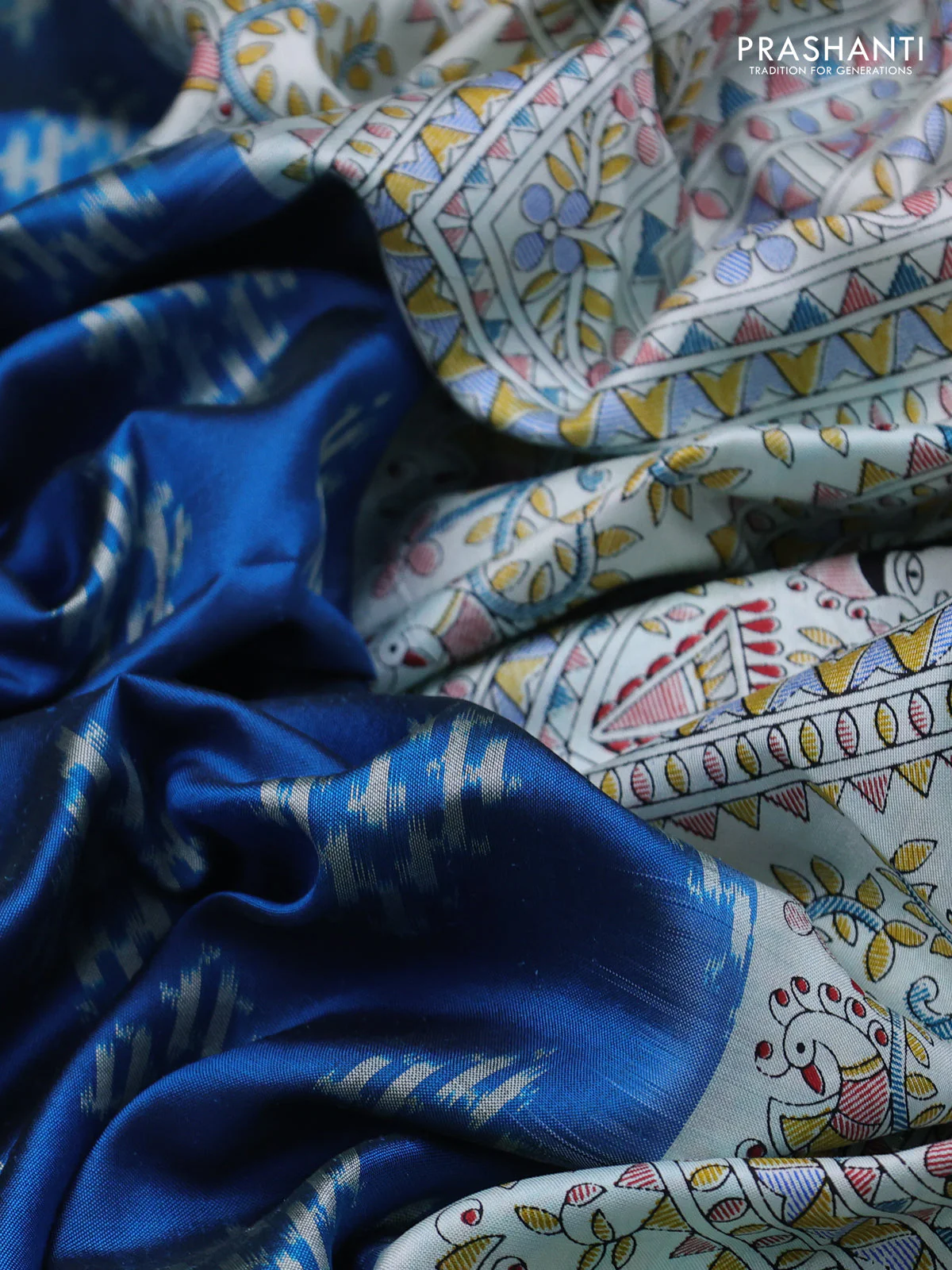Pochampally silk saree cs blue and cream with allover ikat woven buttas and madhubani prints - Image 3