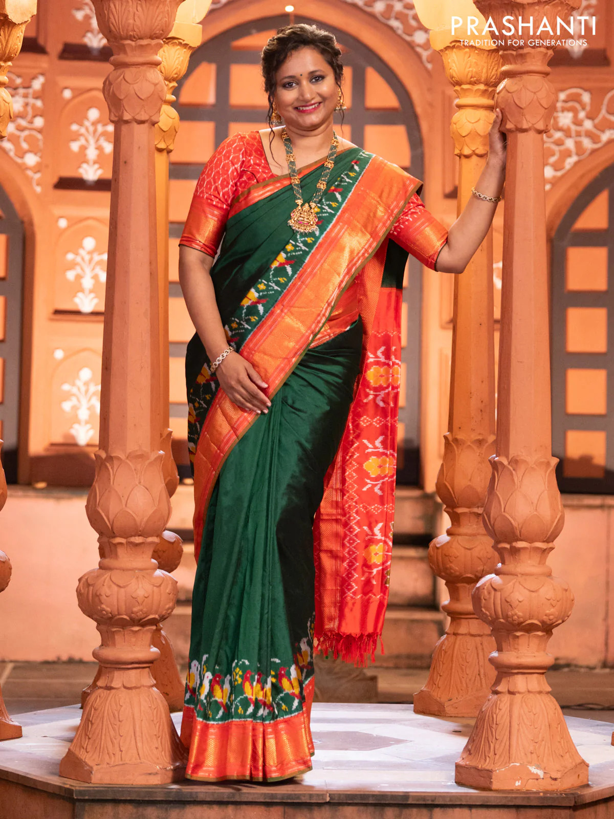 Pochampally silk saree green and red with plain body and long ikat design zari border - Image 2