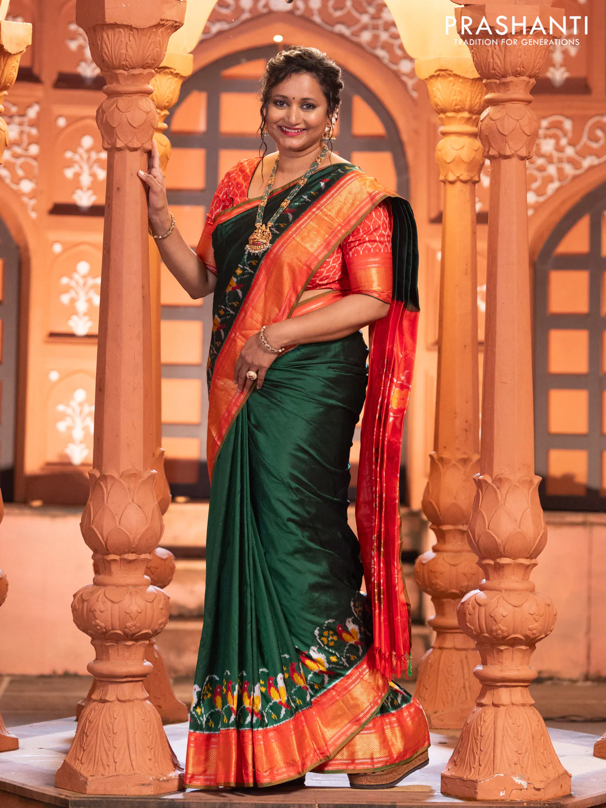 Pochampally silk saree green and red with plain body and long ikat design zari border - Image 3