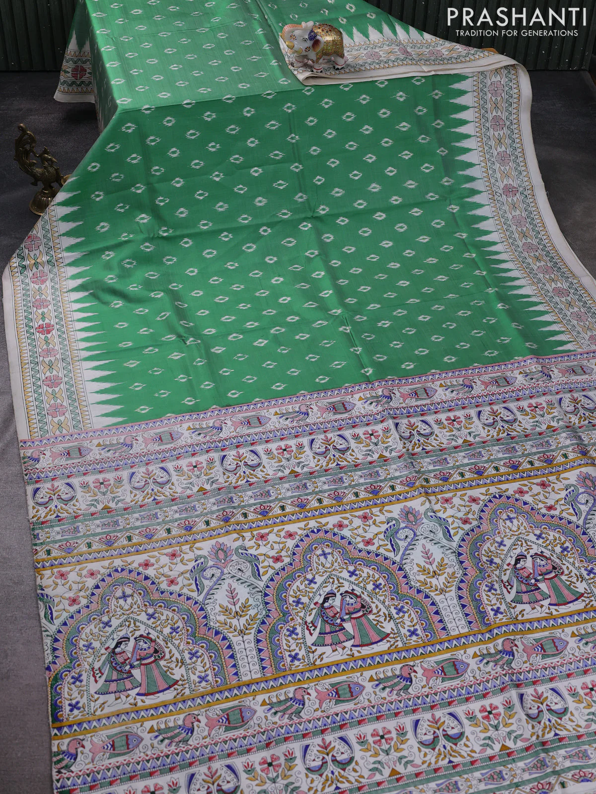 Pochampally silk saree light green and cream with allover ikat woven buttas and madhubani prints - Image 2
