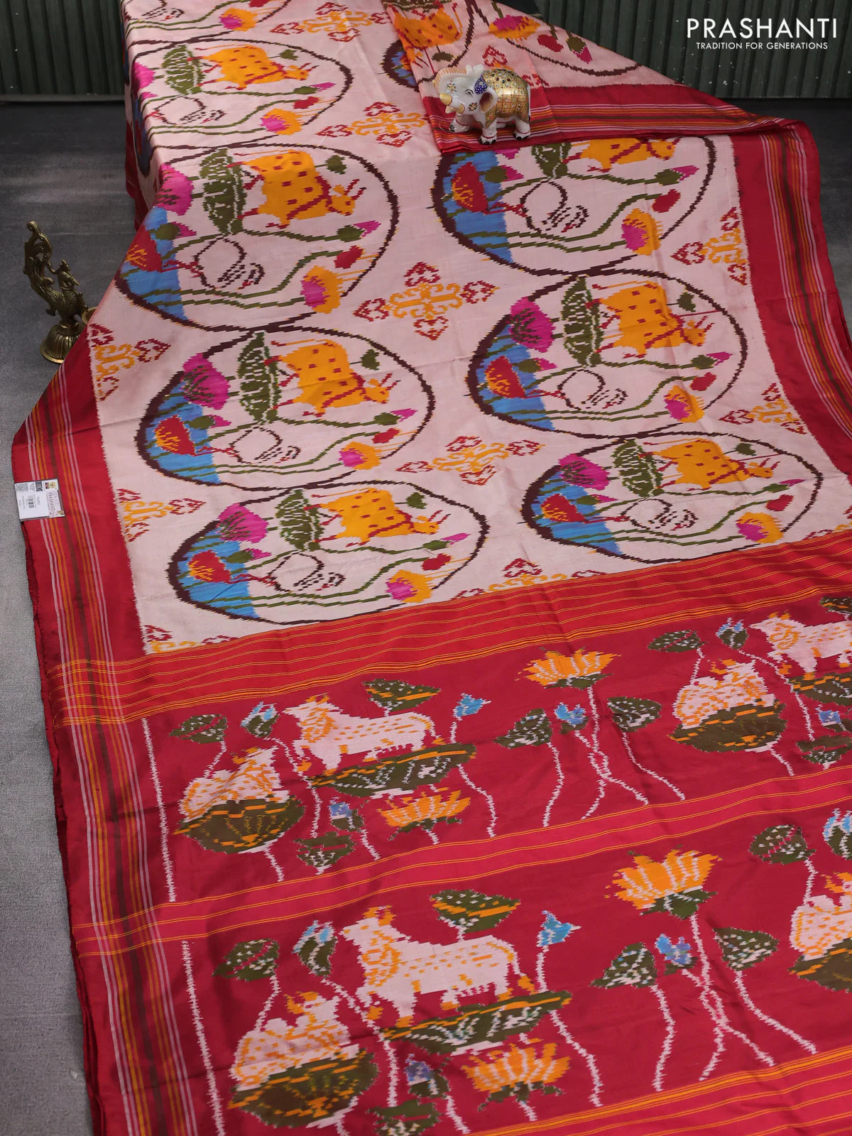 Pochampally silk saree peach shade and red with allover ikat prints and simple border - Image 2