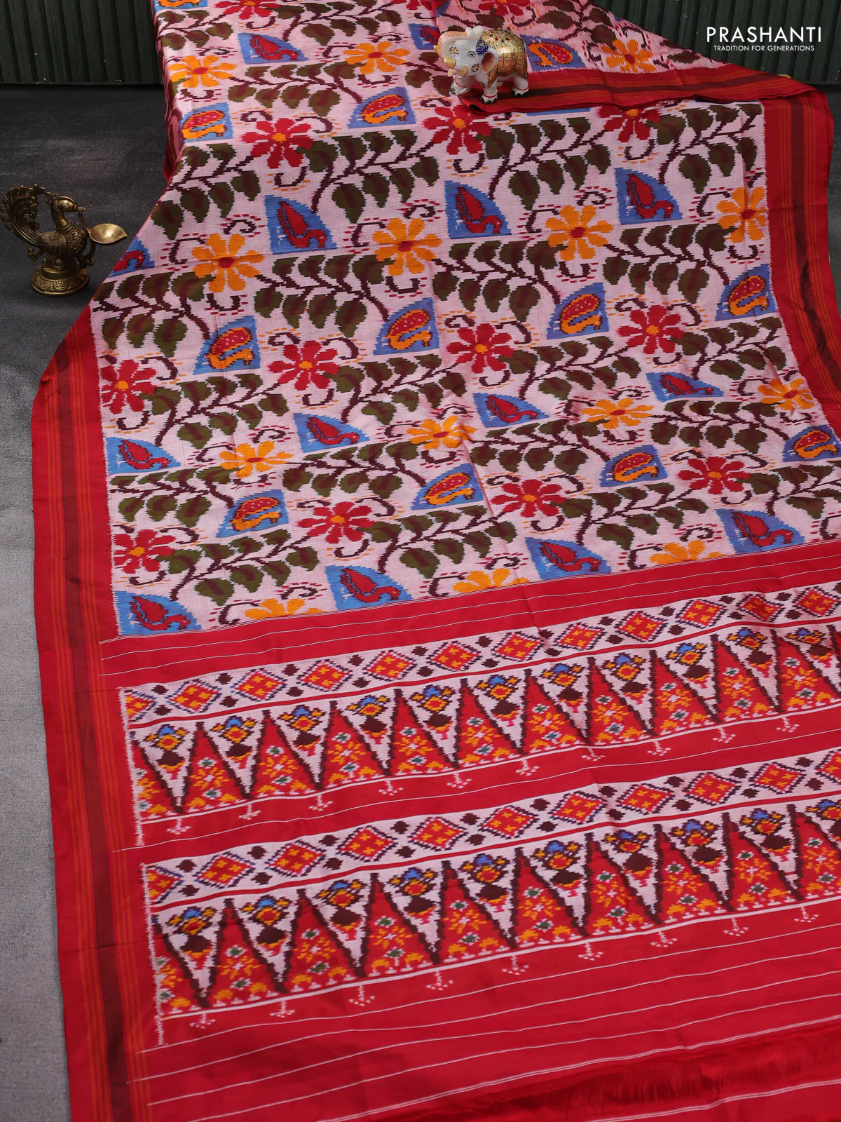 Pochampally silk saree peach shade and red with allover ikat weaves and rettapet border - Image 2