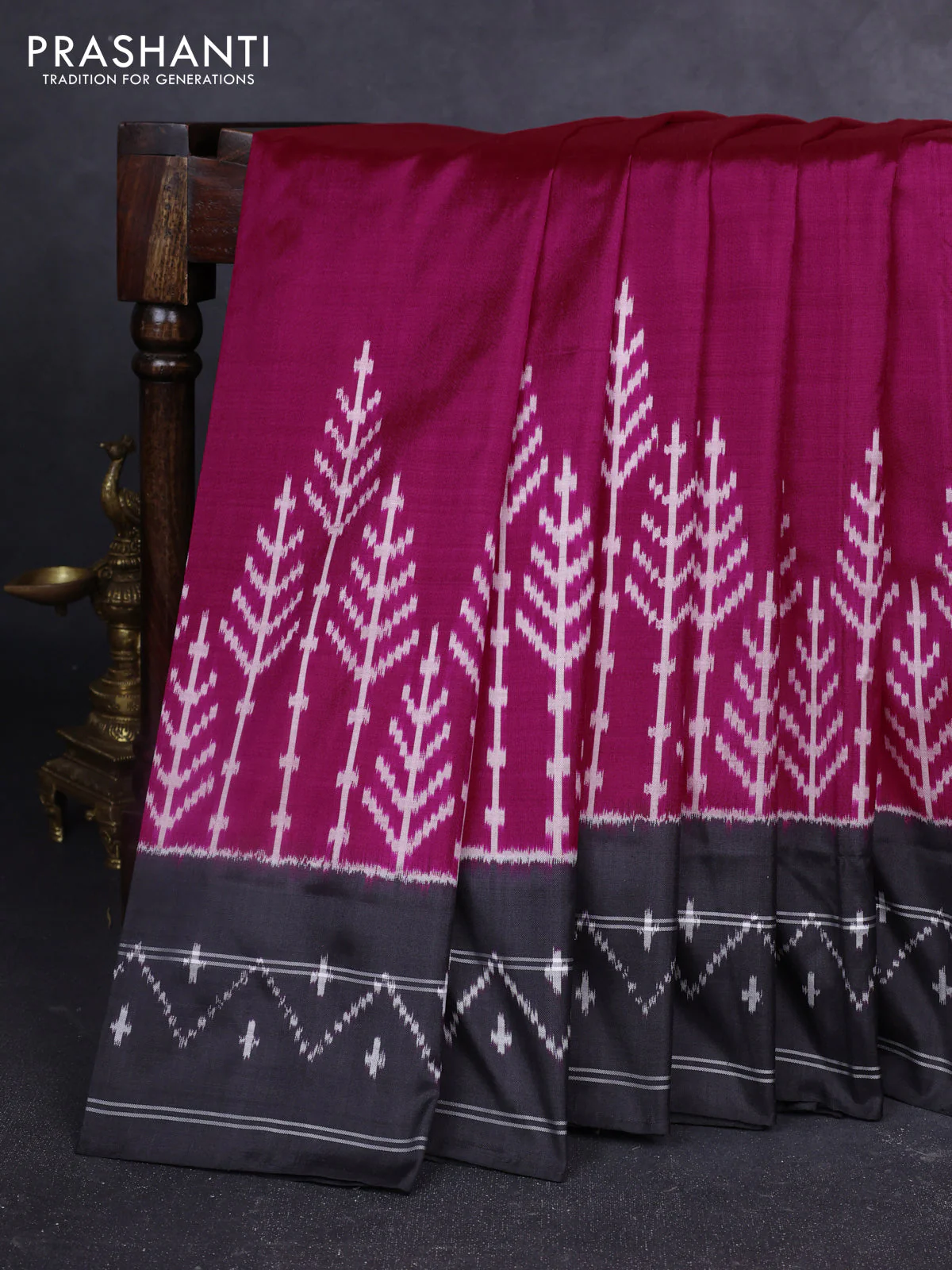 Pochampally silk saree pink and black with plain body and long ikat woven border