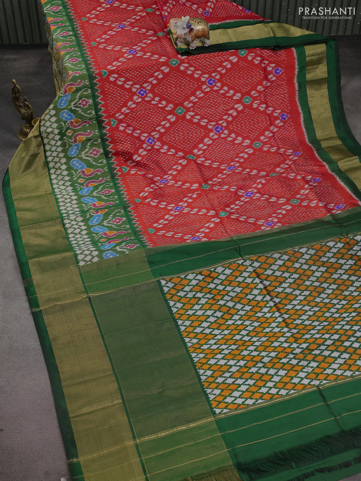 Pochampally silk saree red and green with allover ikat weaves and long ikat woven zari woven border - Image 2