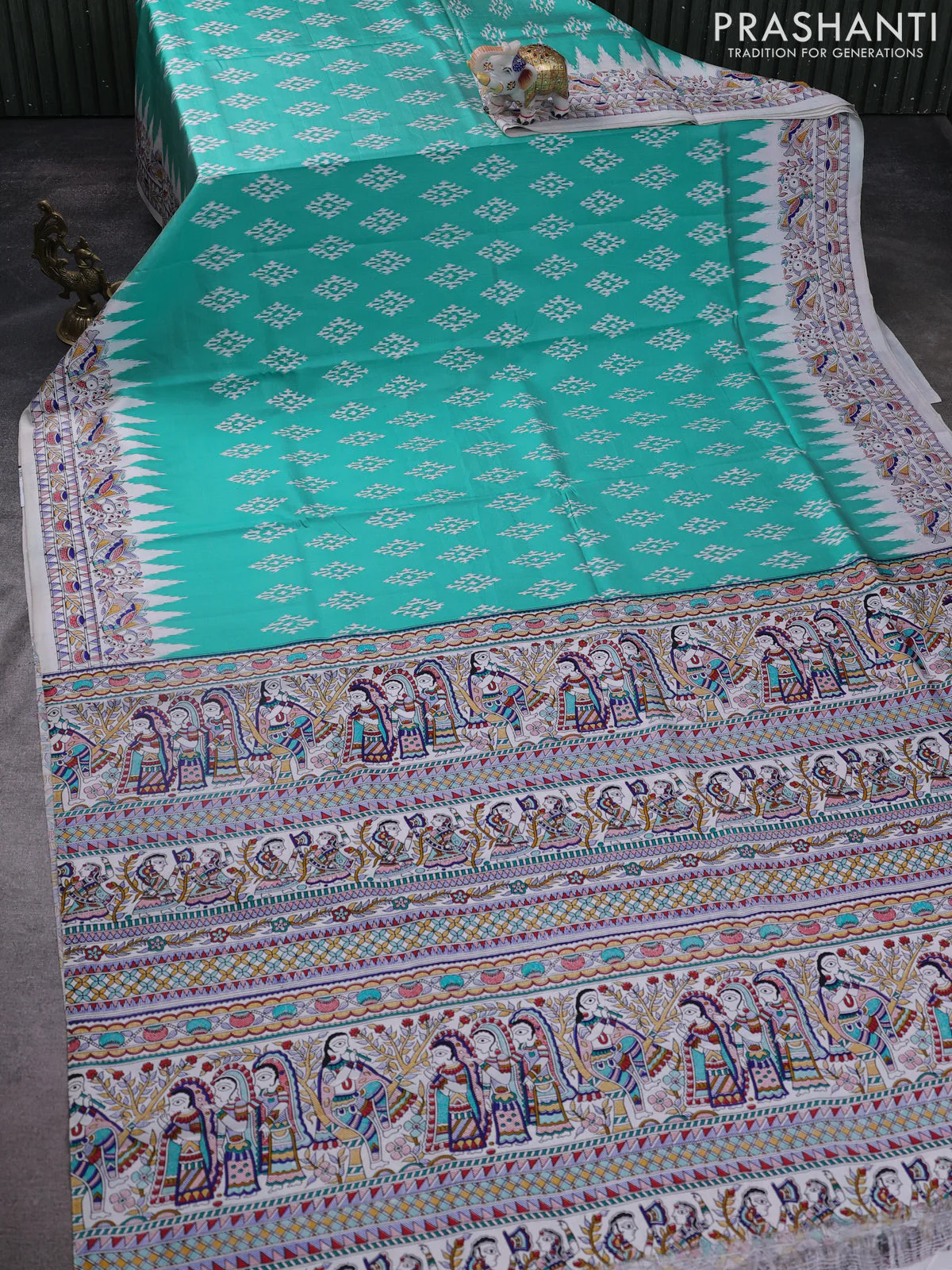 Pochampally silk saree teal green and cream with allover ikat woven buttas and madhubani prints - Image 2
