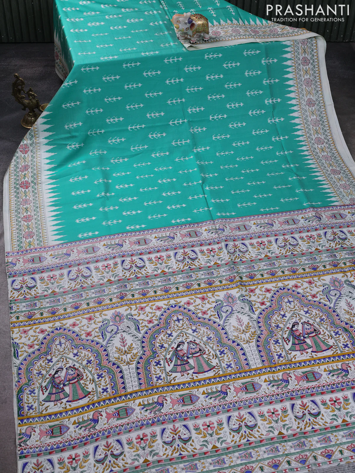 Pochampally silk saree teal green and cream with allover ikat woven buttas and madhubani prints - Image 2