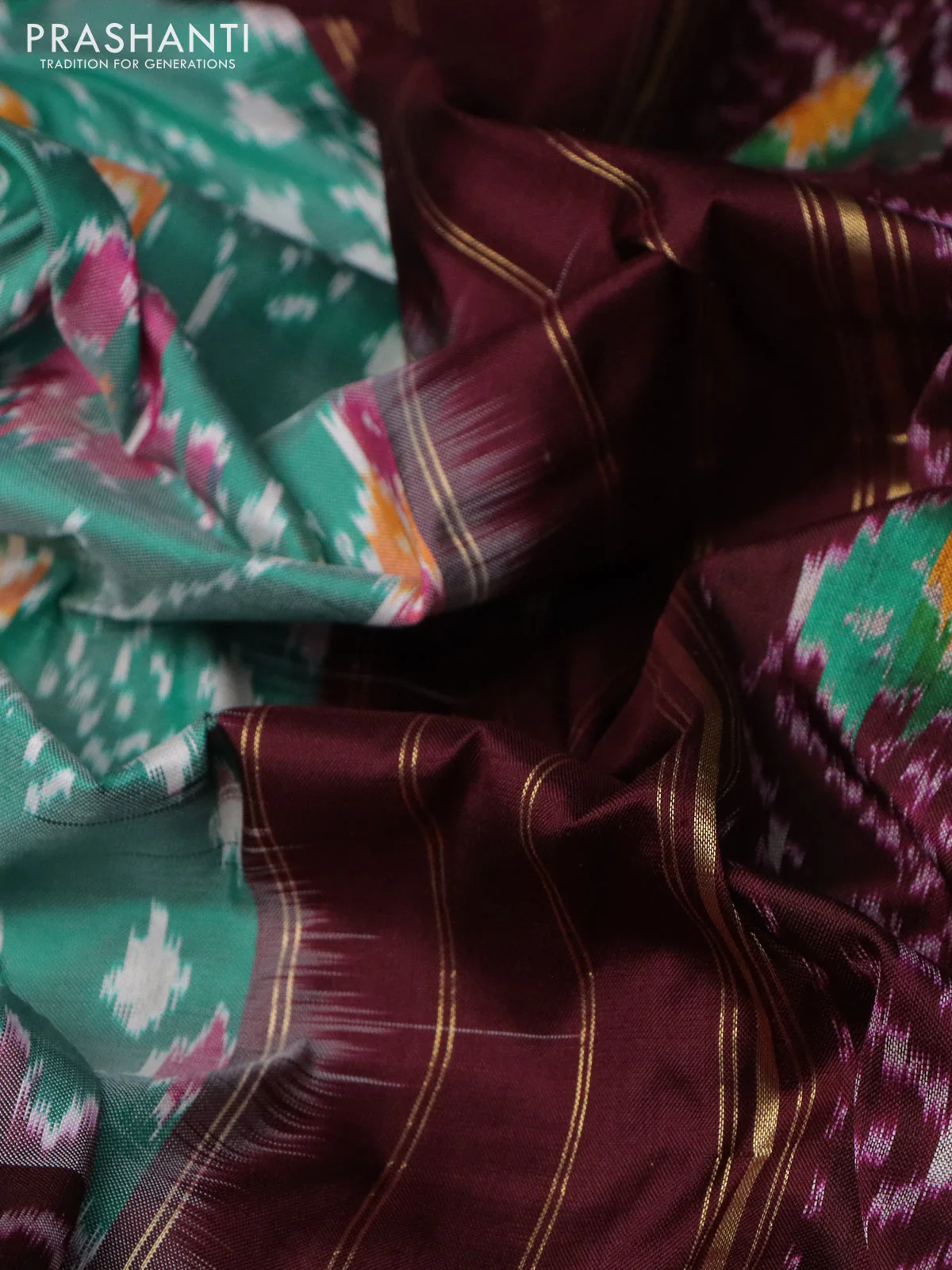 Pochampally silk saree teal green and deep maroon with allover ikat weaves and long ikat woven zari woven border - Image 3