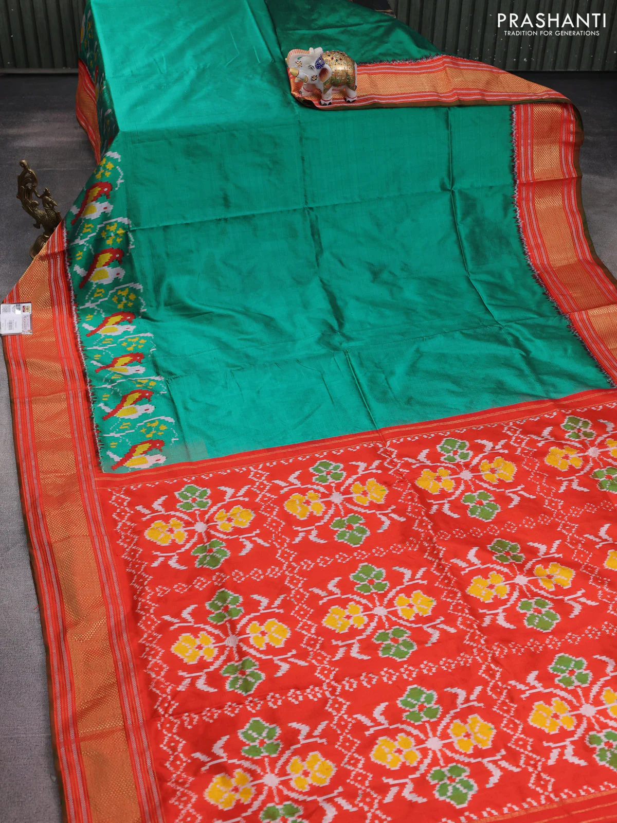 Pochampally silk saree teal green and orange with plain body and ikat woven zari border - Image 2