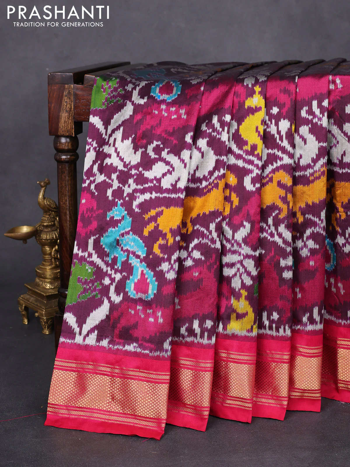 Pochampally silk saree wine shade and pink with allover patola weaves and zari woven border