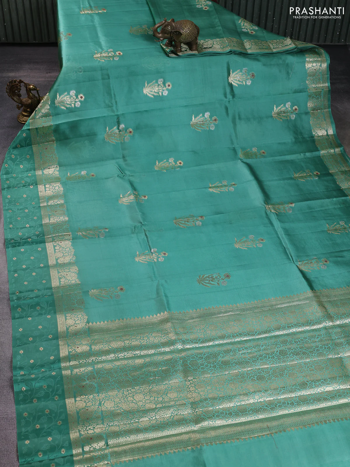 Poona silk saree teal green with floral zari woven buttas and zari woven self emboss border - Image 2