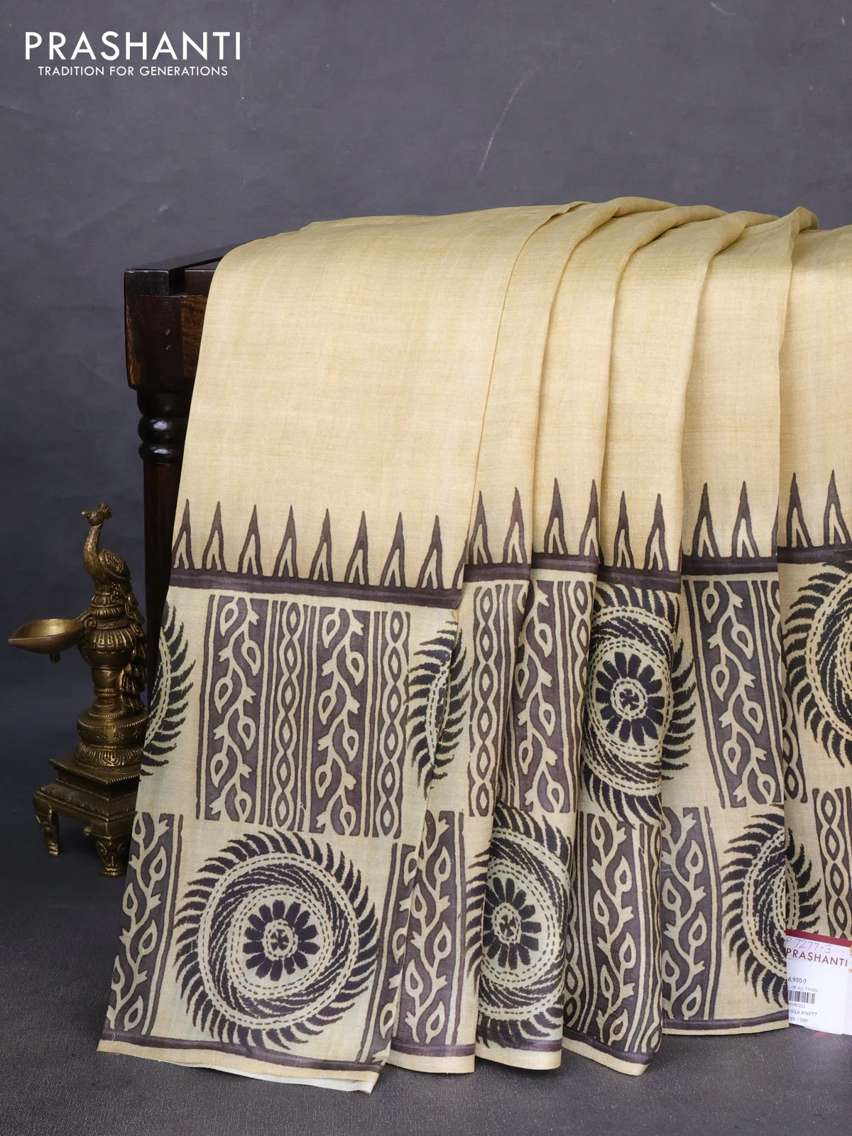 Printed silk saree beige and black with plain body and long printed border - Image 2