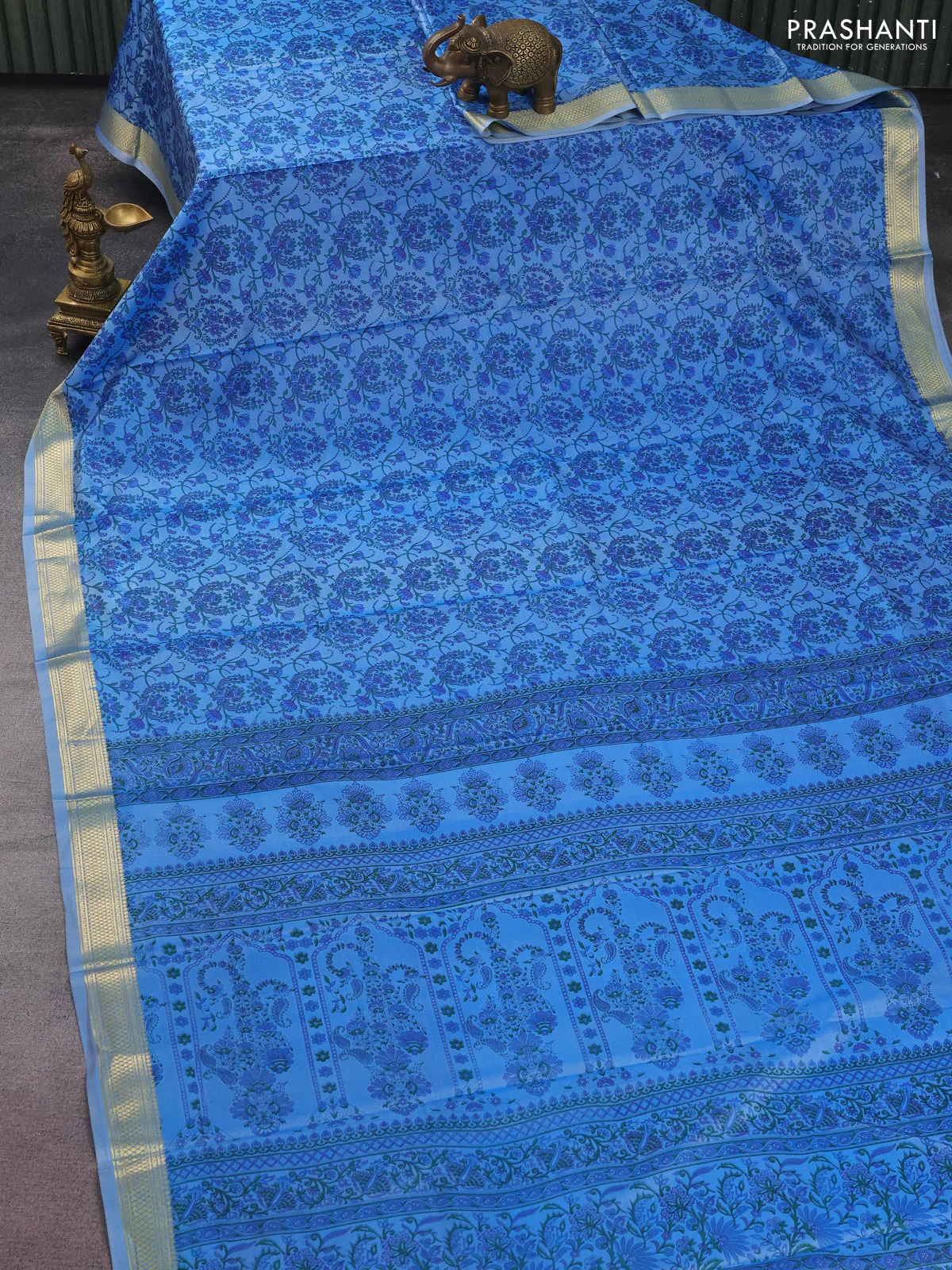 Printed silk saree pastel blue with allover prints and zari woven border - Image 2