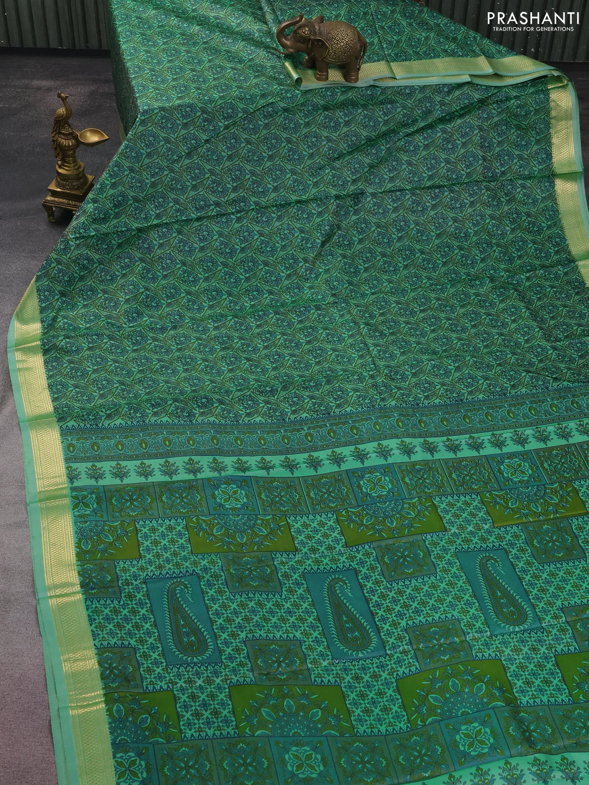 Printed silk saree pastel green with allover prints and zari woven border - Image 2