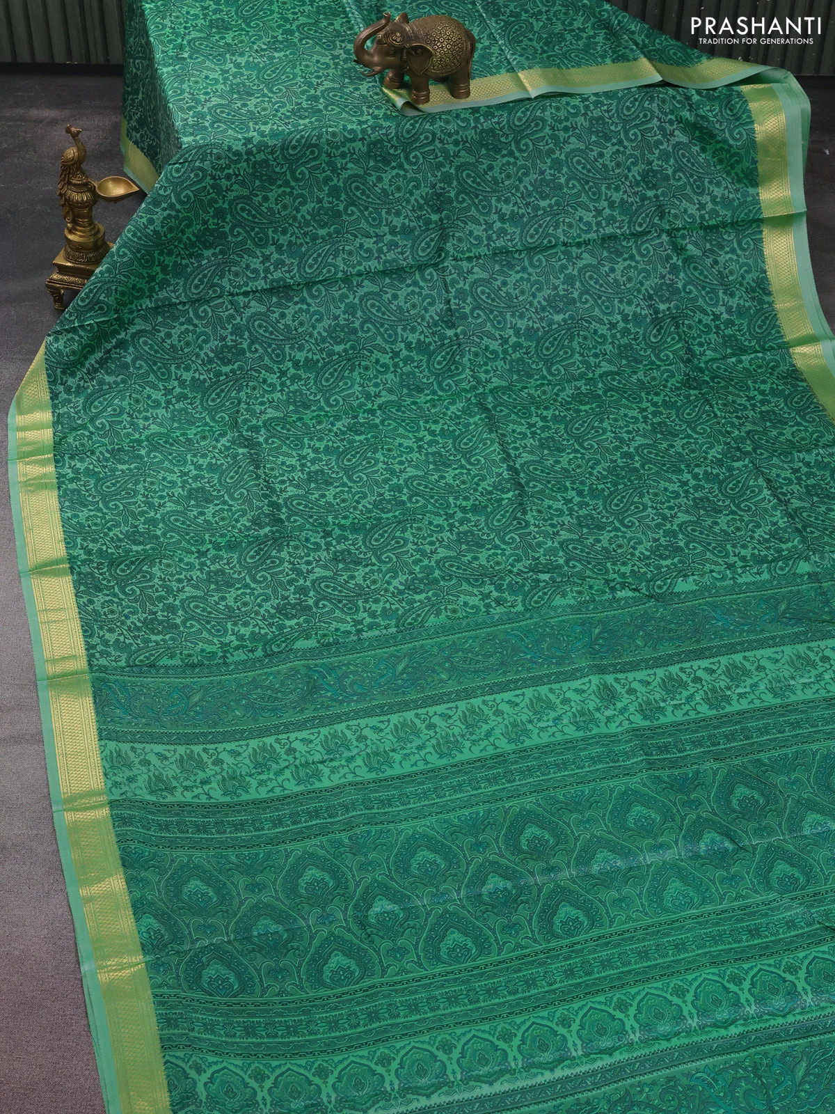 Printed silk saree pastel green with allover prints and zari woven border - Image 2
