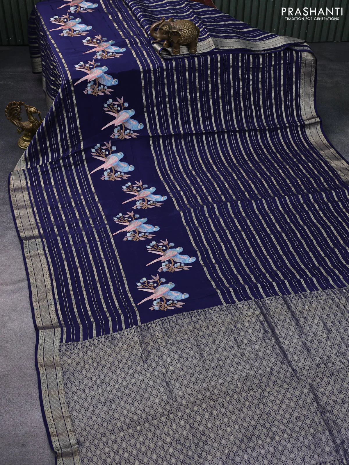 Pure crepe saree blue with allover zari weaves & embroidery work and zari woven border - Image 2