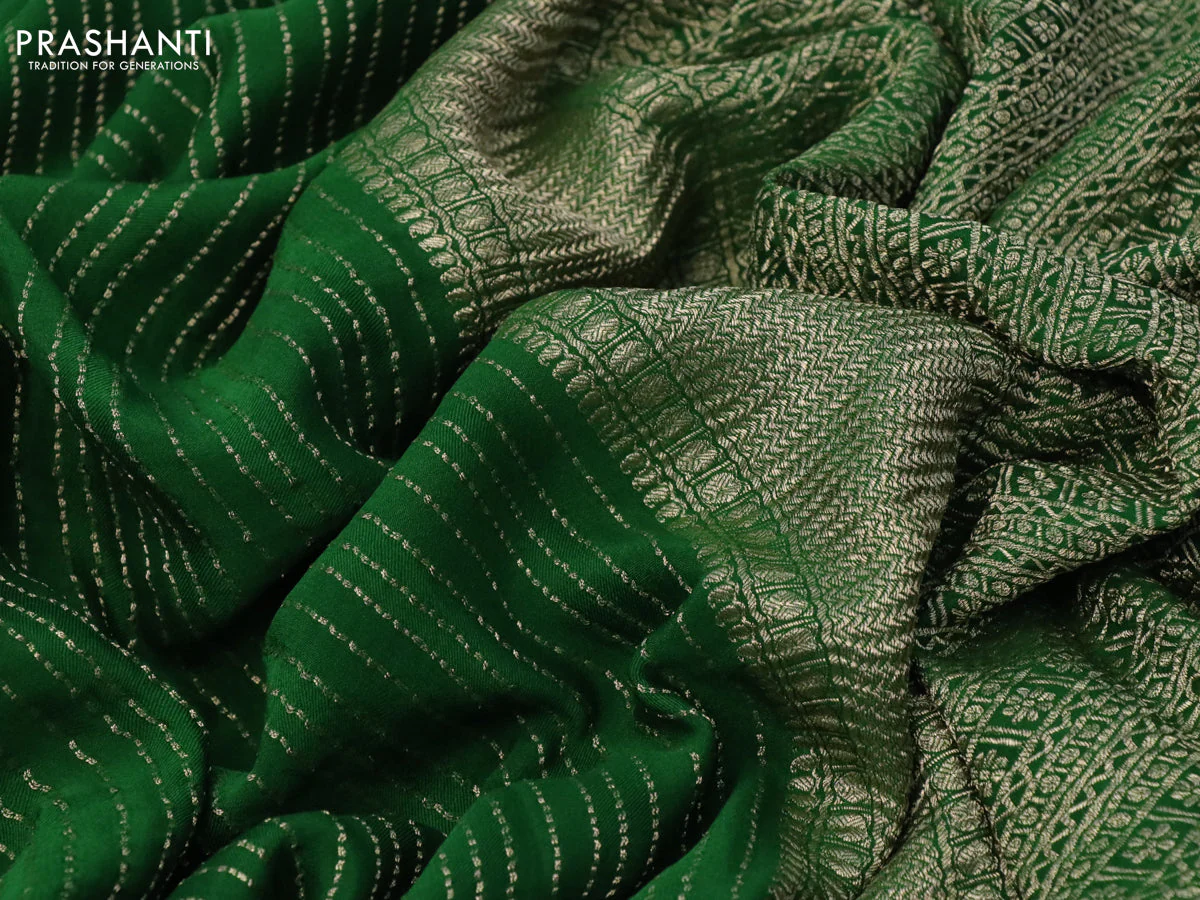 Pure crepe saree green with allover zari weaves & embroidery work and zari woven border - Image 3