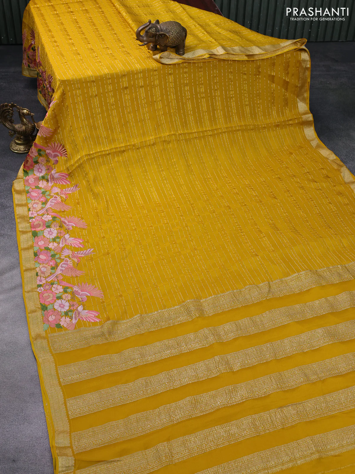 Pure crepe saree mustard yellow with allover zari weaves & embroidery work and zari woven border - Image 2