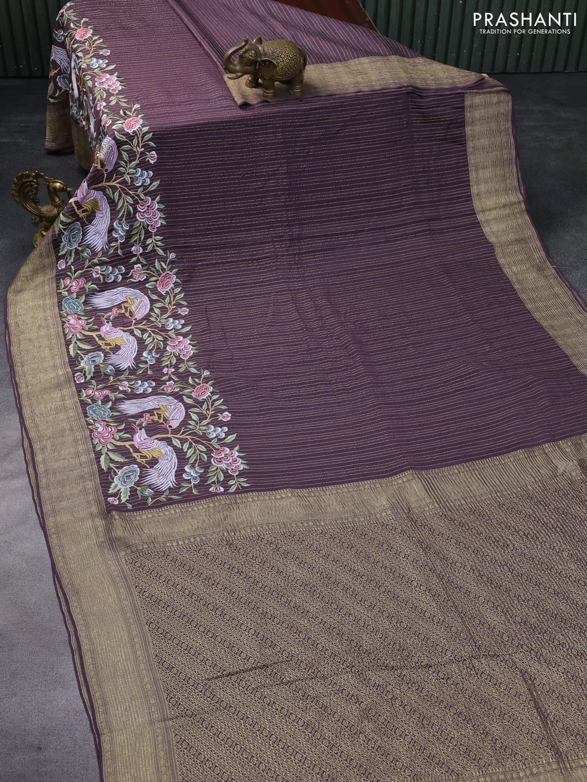 Pure crepe saree pastel jamun shade with allover zari weaves & embroidery work and zari woven border - Image 2