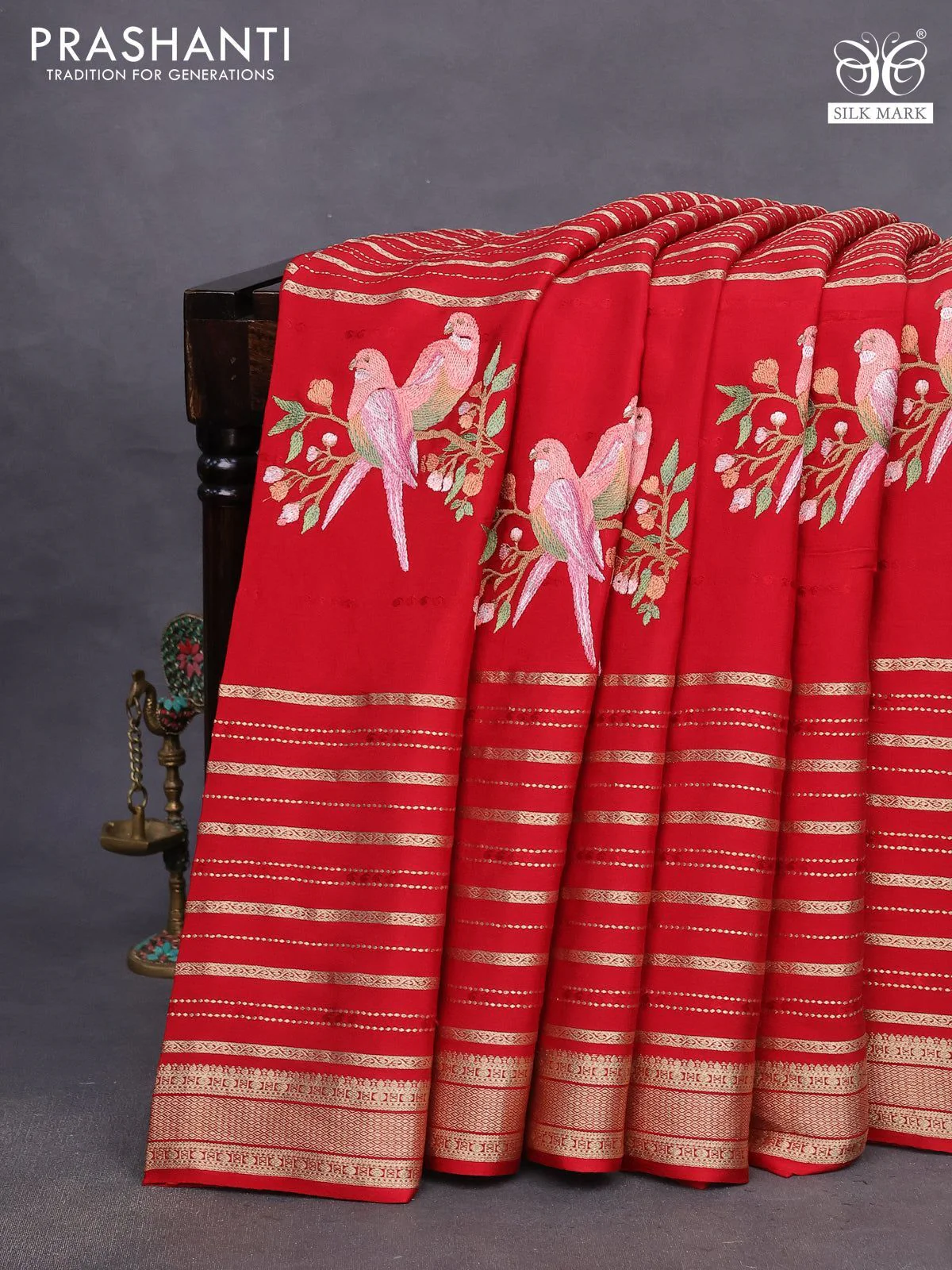 Pure crepe saree red with allover zari weaves & embroidery work and zari woven border