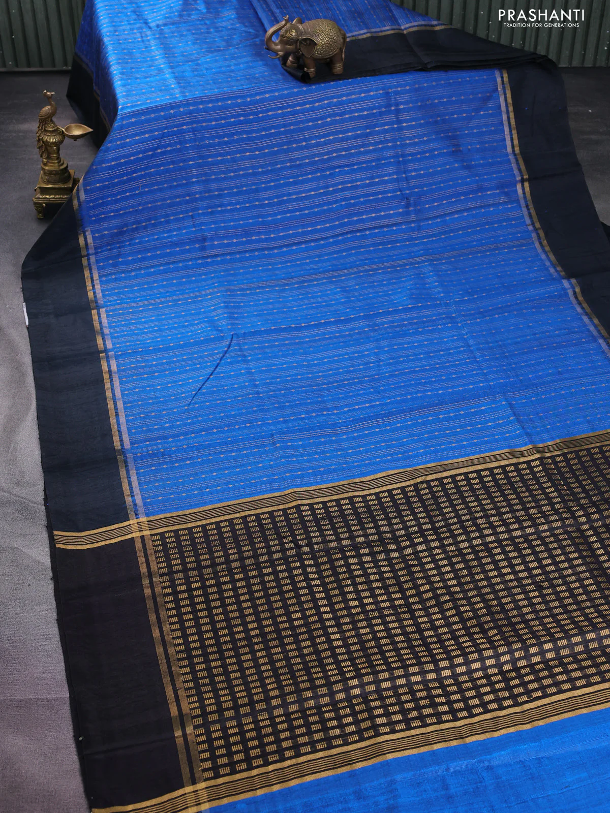 Pure dupion silk saree cs blue and black with allover zari weaves and zari woven simple border - Image 2