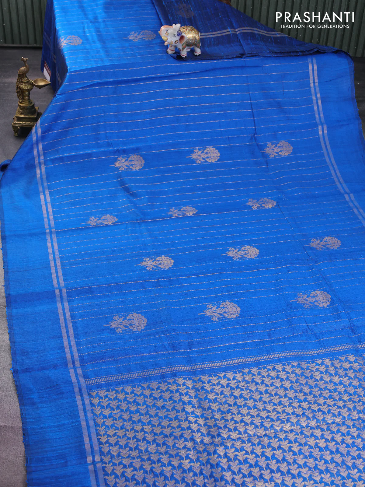 Pure dupion silk saree cs blue with allover zari weaves and zari woven simple border - Image 2