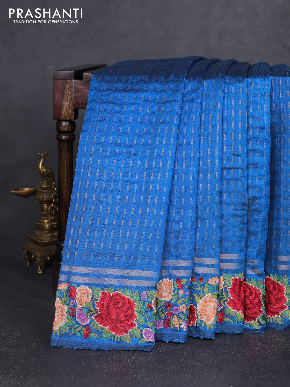Pure dupion silk saree cs blue with allover zari woven butta weaves and zari woven floral embroidery border