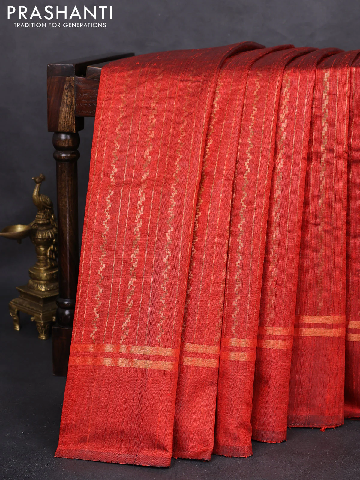 Pure dupion silk saree orange with allover zari weaves and zari woven simple border