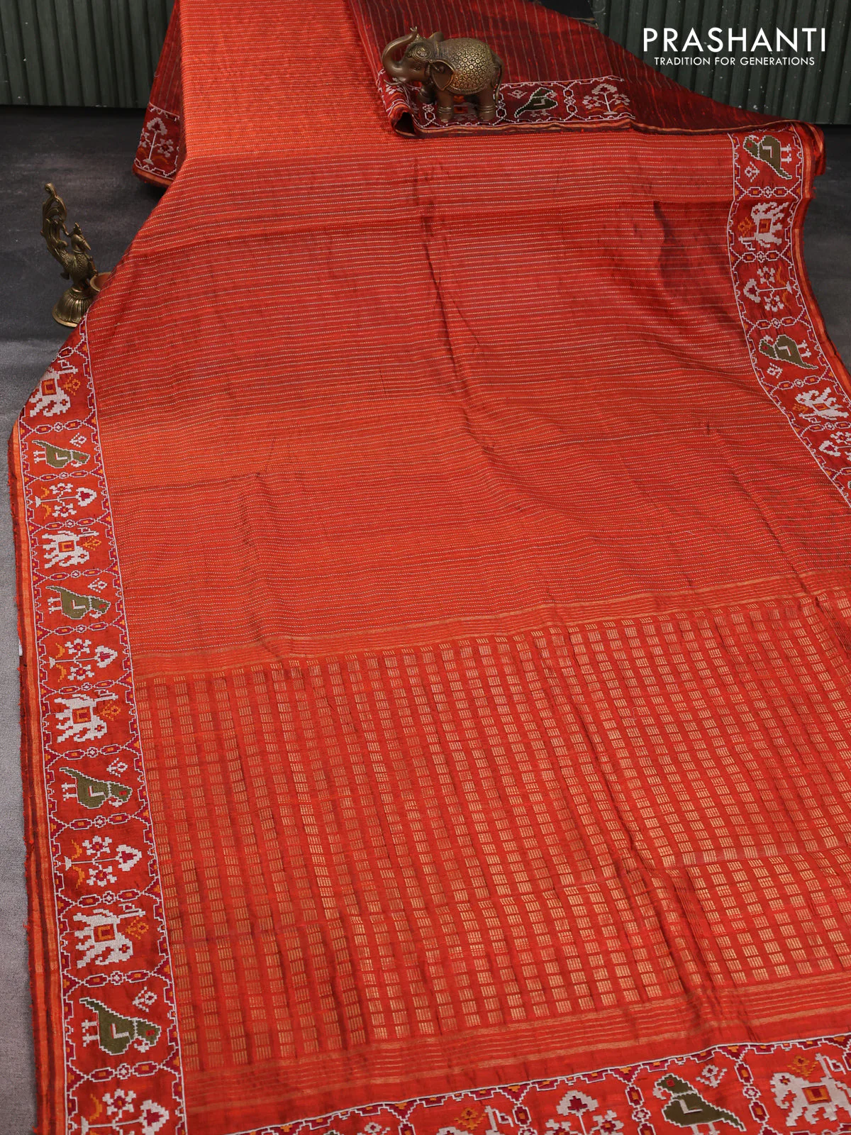 Pure dupion silk saree rustic orange with allover thread & zari weaves and ikat design embroidered border - Image 2