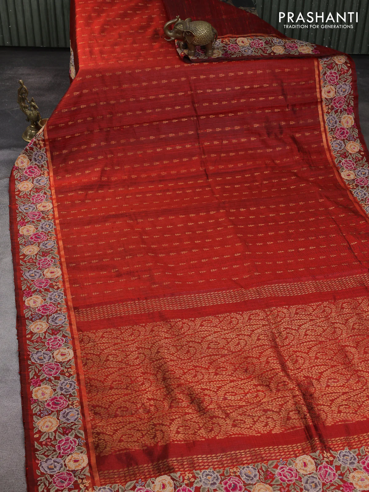 Pure dupion silk saree rustic orange with allover zari woven buttas and zari woven floral embroidery border - Image 2