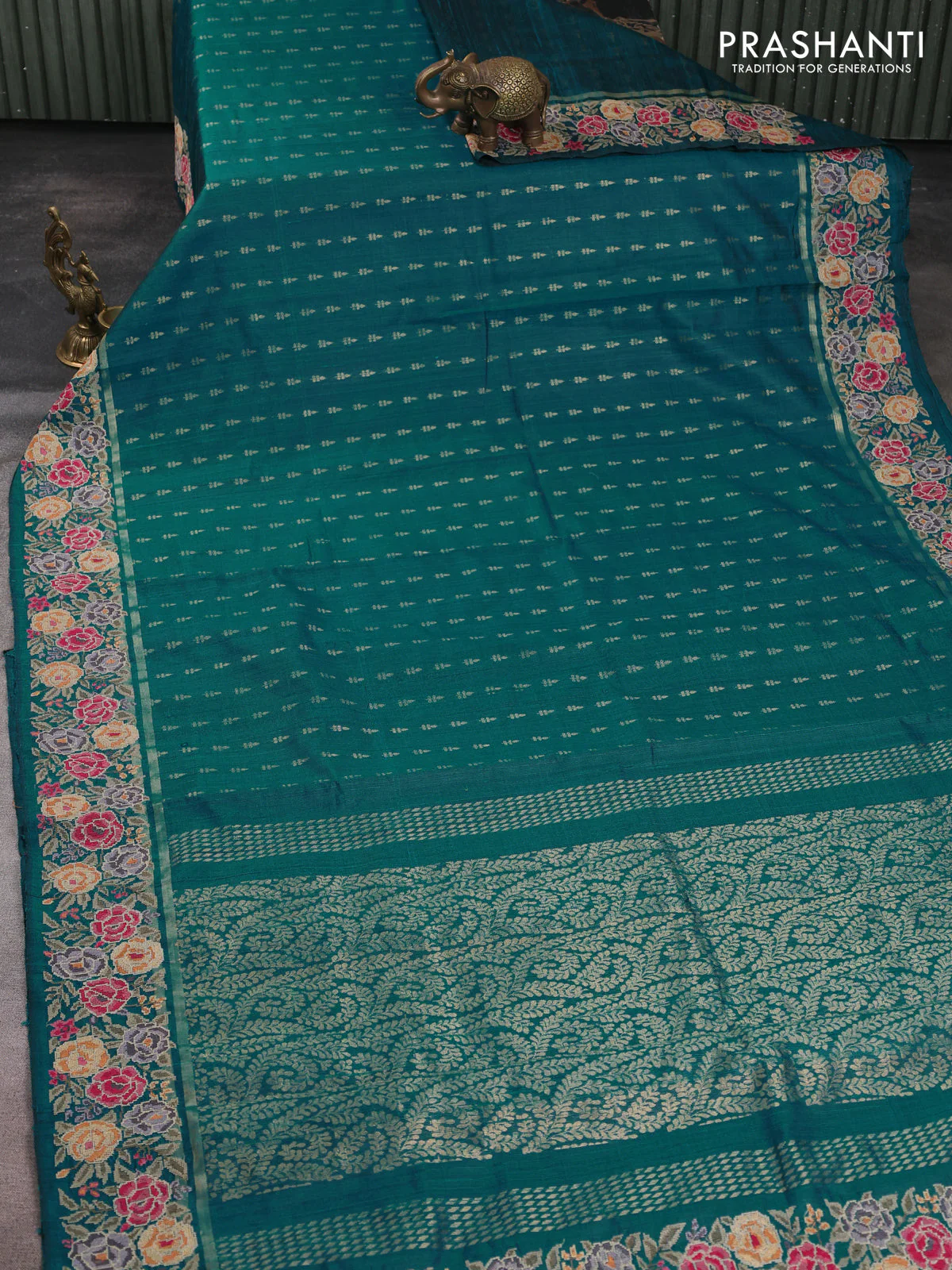 Pure dupion silk saree teal green shade with allover zari woven buttas and zari woven floral embroidery border - Image 2
