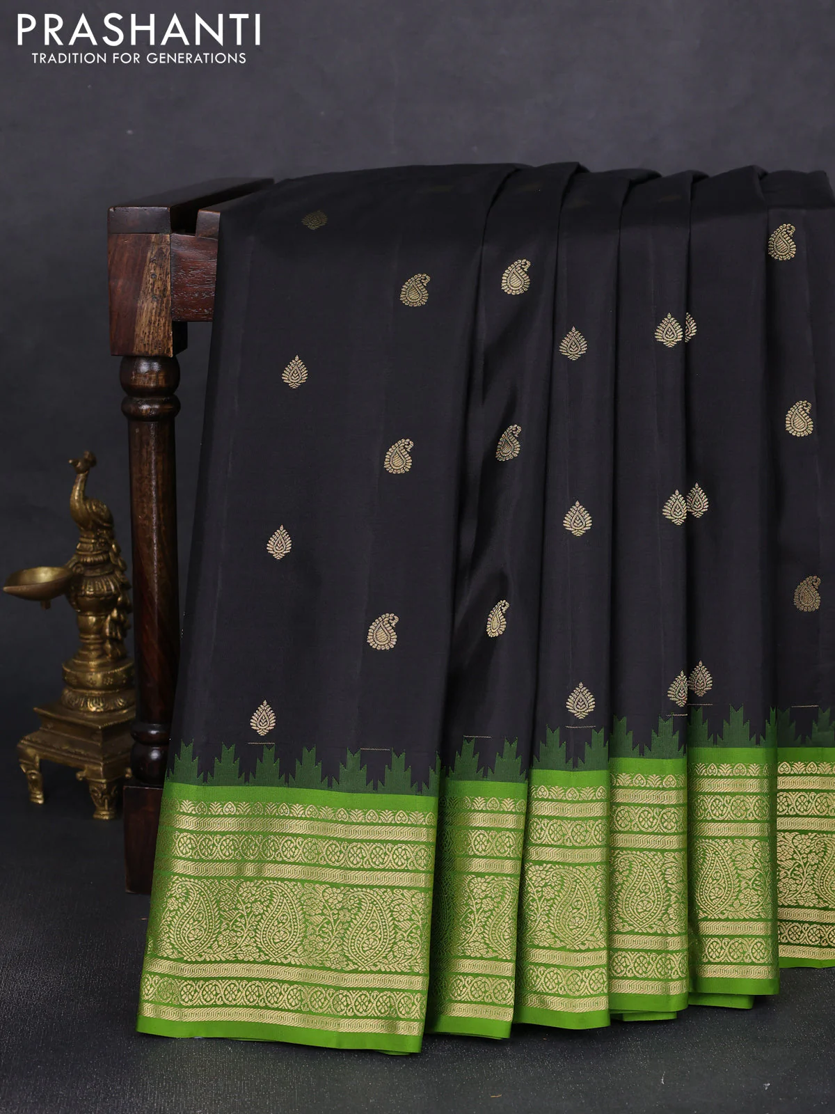 Pure gadwal silk saree black and mehendi green with zari woven buttas and temple design paisley zari woven border