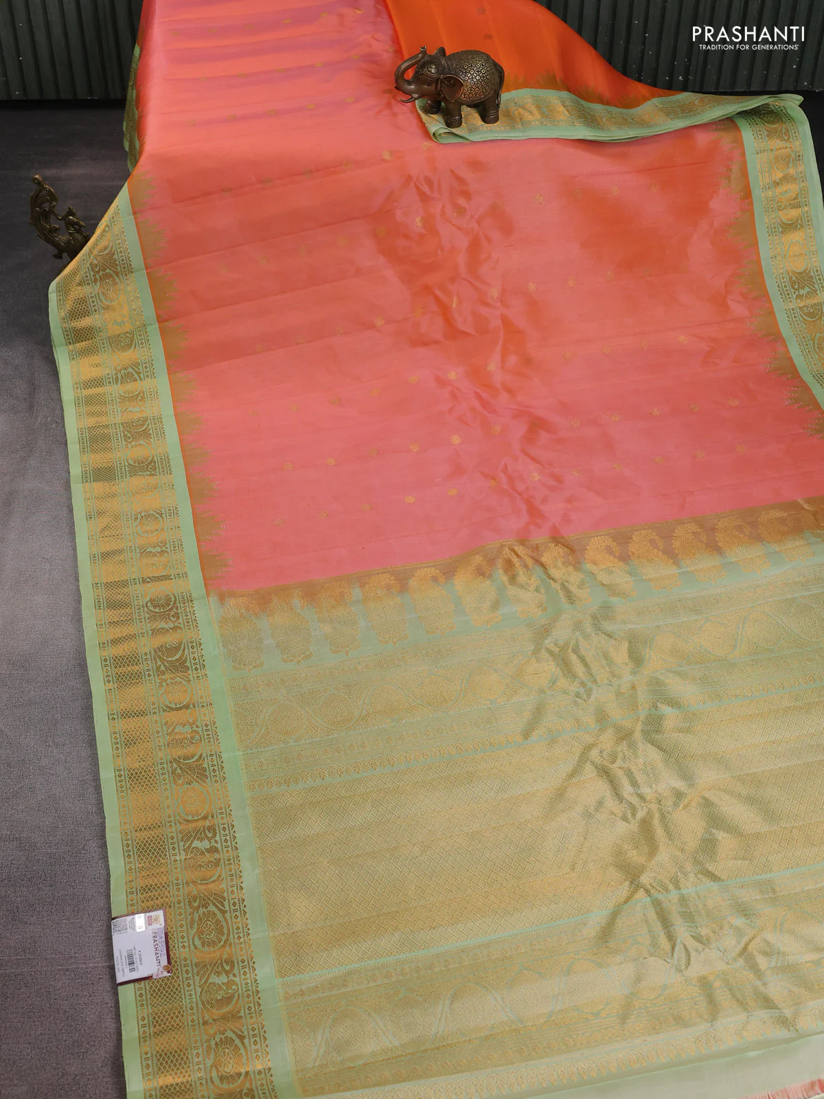 Pure gadwal silk saree dual shade of peach orange and pista green with zari woven buttas and temple design zari woven border - Image 2