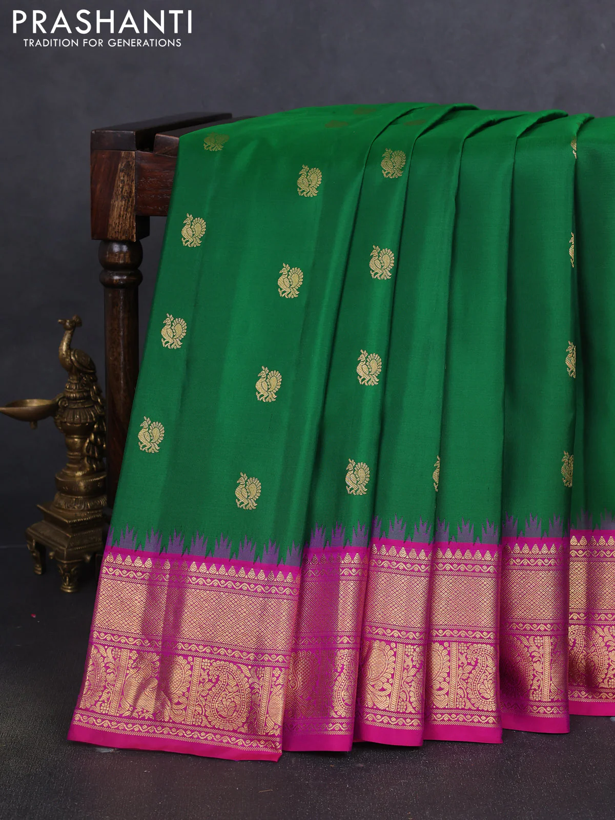 Pure gadwal silk saree green and magenta pink with annam zari woven buttas and temple design zari woven border