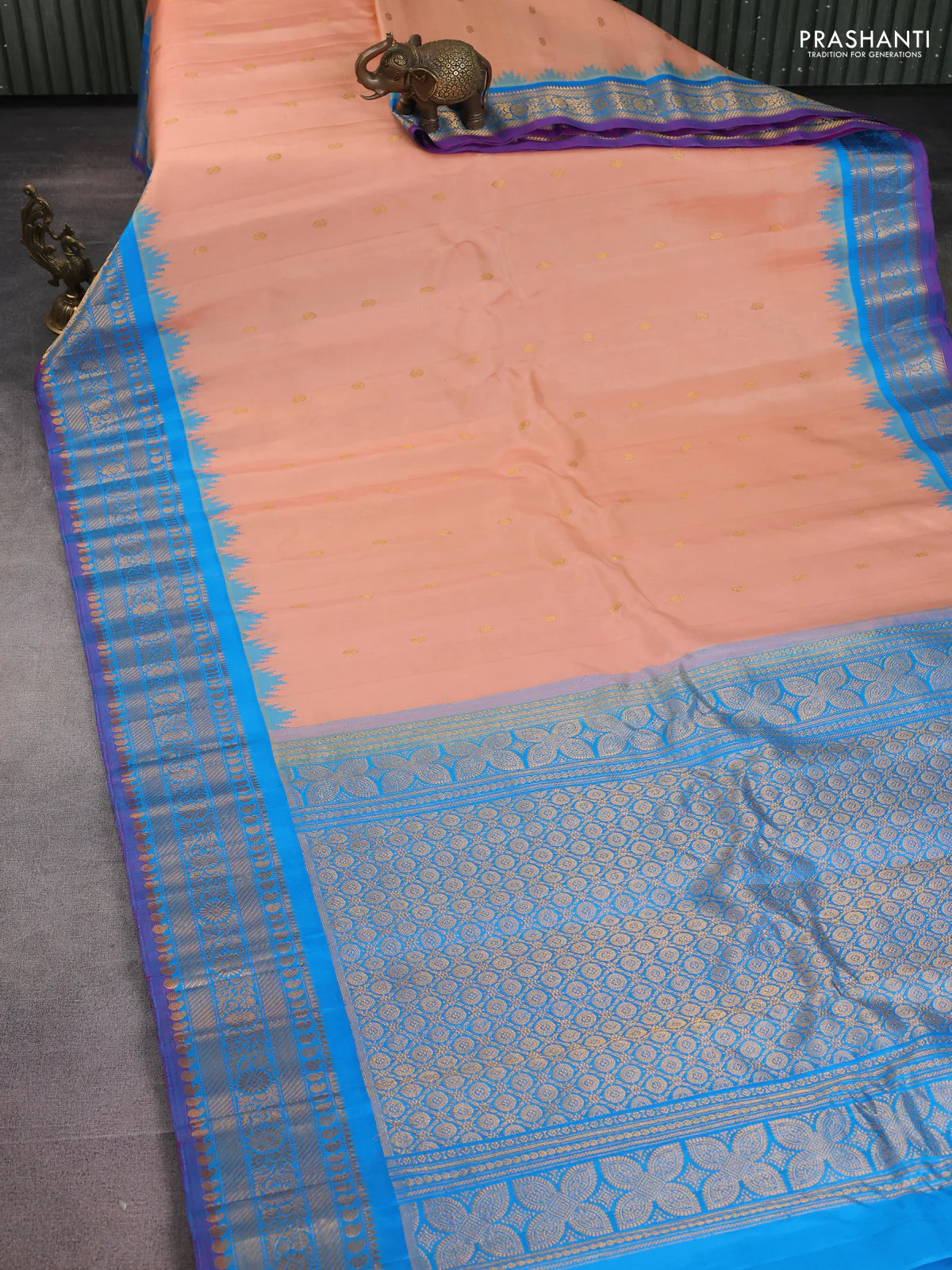 Pure gadwal silk saree peach orange and cs blue with zari woven buttas and temple design zari woven border - Image 2
