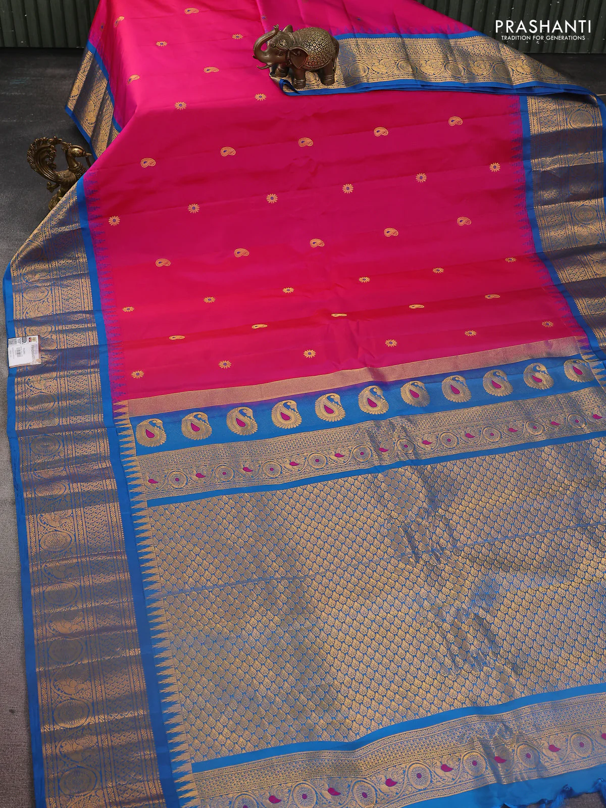 Pure gadwal silk saree pink and cs blue with paisley zari woven buttas and temple design zari woven border - Image 2