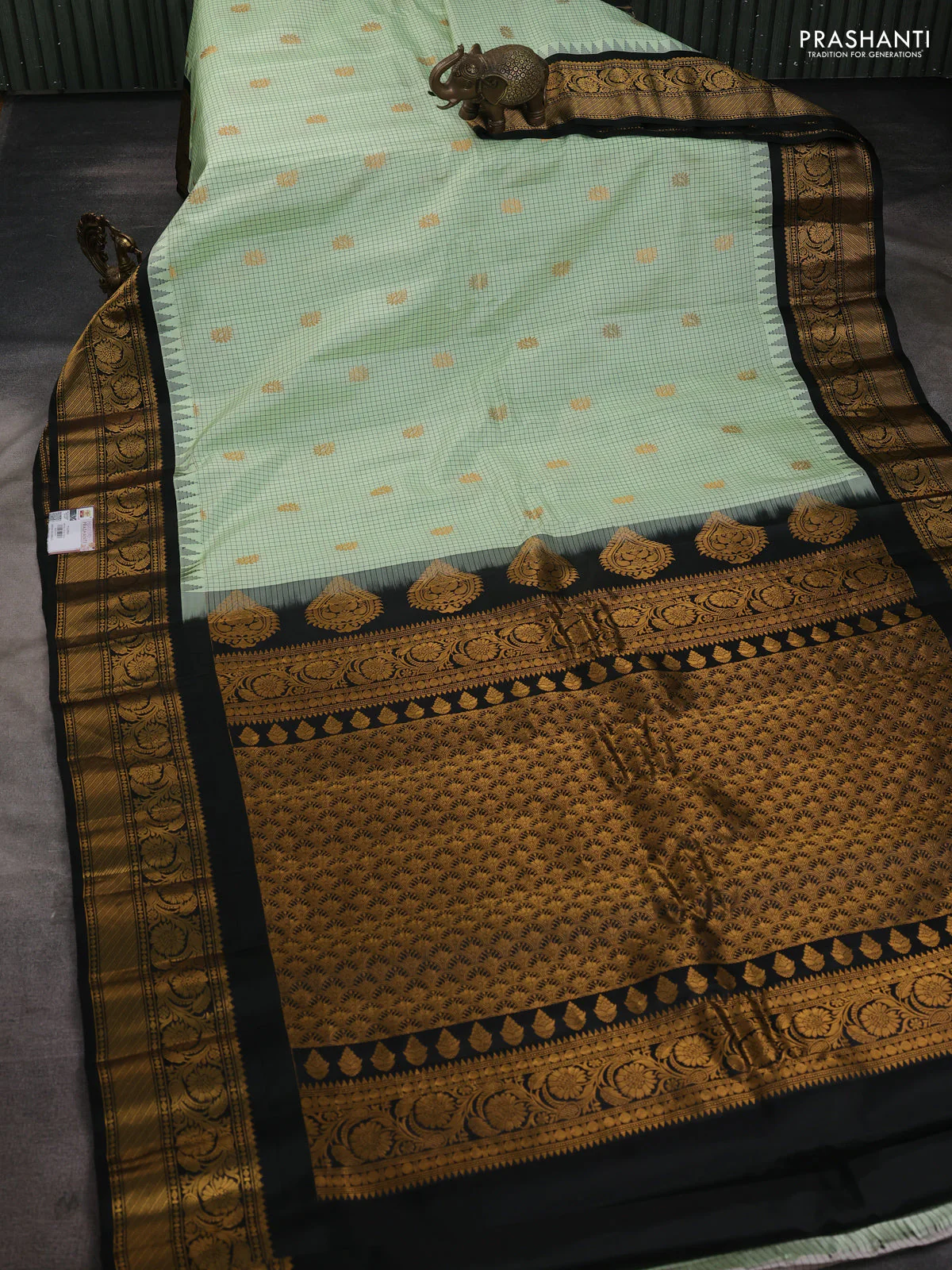 Pure gadwal silk saree pista green and black with allover zari checks & buttas and temple design zari woven border - Image 2