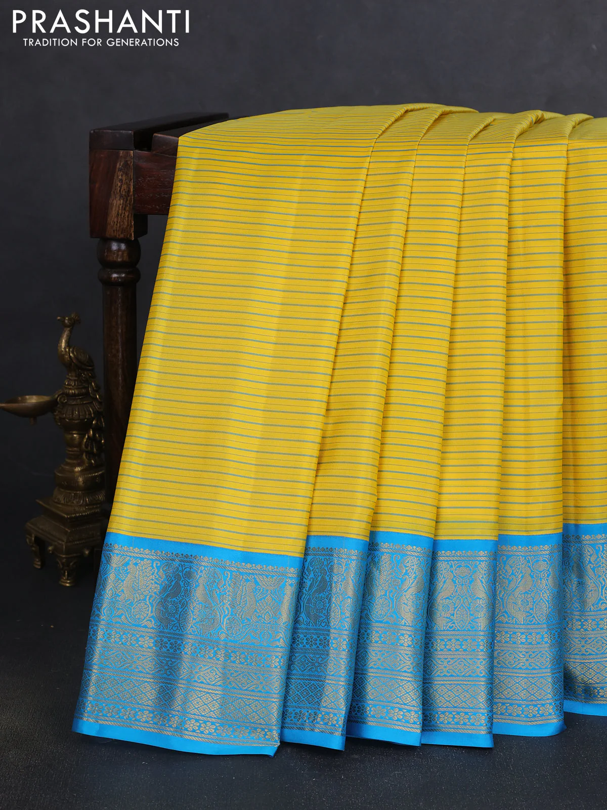 Pure gadwal silk saree yellow and cs blue with allover stripe pattern and zari woven korvai border