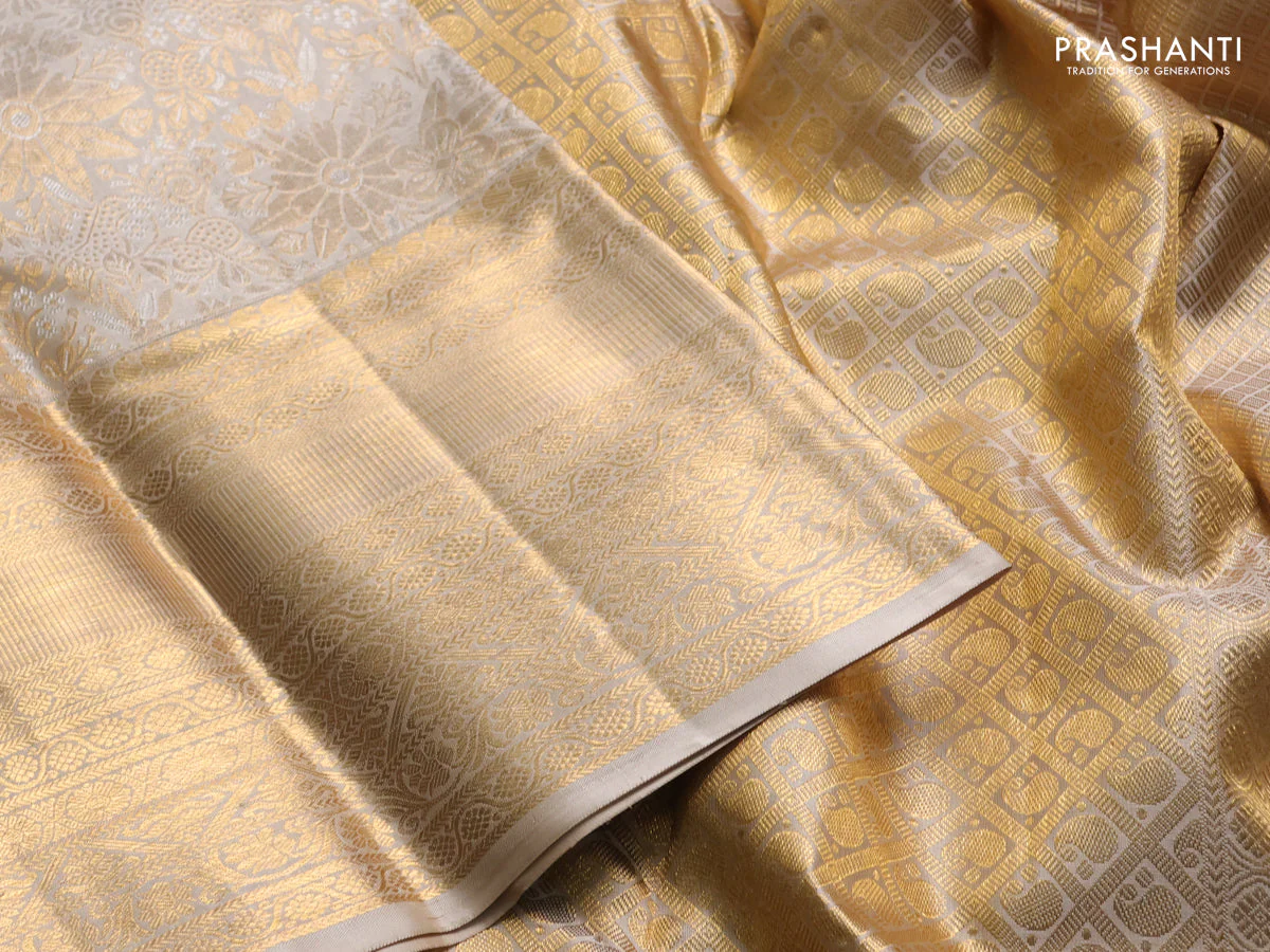 Pure kanchipuram silk saree beige with allover silver & gold zari woven brocade weaves and long rich zari woven border - Image 3