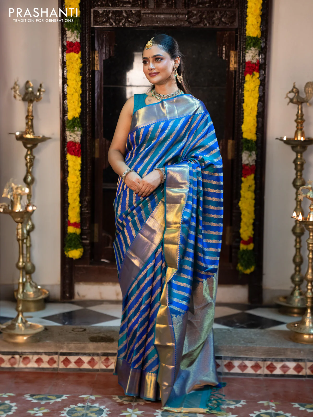 Pure kanchipuram silk saree blue and peacock blue with allover zari woven stripes pattern and zari woven border - Image 2