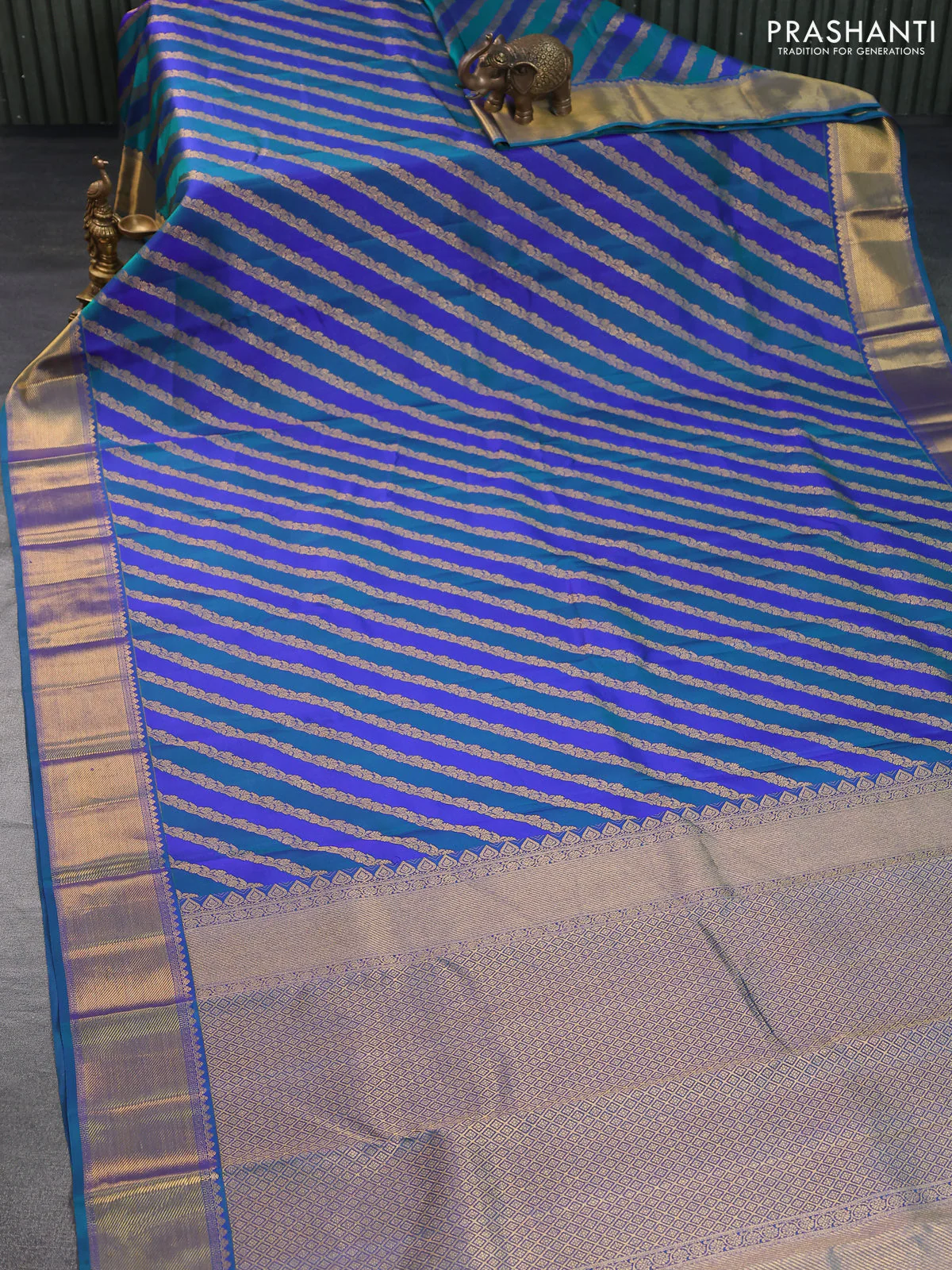 Pure kanchipuram silk saree blue and peacock blue with allover zari woven stripes pattern and zari woven border - Image 8